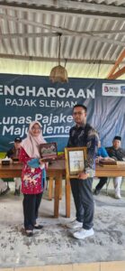 PENYERAHAN PIAGAM LUNAS PBB-P2 KALURAHAN WIDODOMARTANI TAHUN 2025